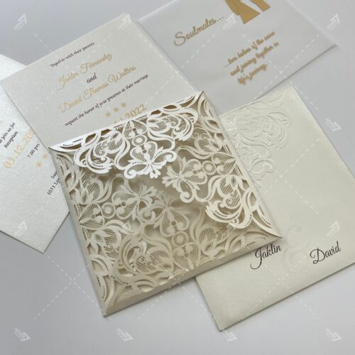 white pearl simple lasercut card with four fold leaves