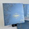 Ice Blue Card with Embossed and Gold Foil Lilly & Rose Design in Silk Feel Paper