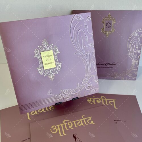 Lilac Purple Card in Traditional Indian Design with Gold Foil on Emblem & Florals Golden Acrylic Nameplate for couple names in Silk Feel Paper