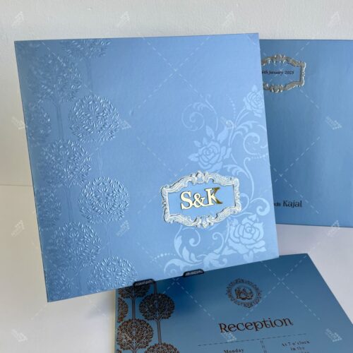 Vintage Style Gold foil Wedding Monogram Embossed Tree Leaves Designs around with Golden Lasercut Initials in Icy Blue Colour Silk Feel Paper