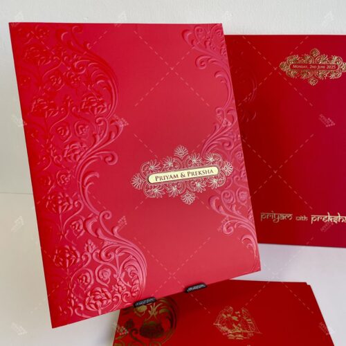 Red Rose Colour Card Embossed Floral Motifs with Couple nameplate on Golden Acrylic in Silk Feel Paper