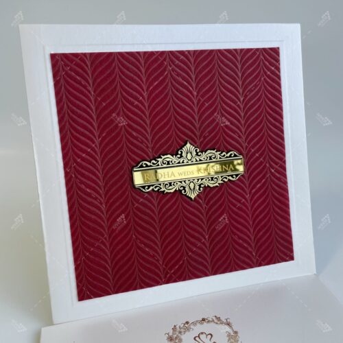 Embossed Design Wooly in Shimmery White & Maroon Wedding Invitation