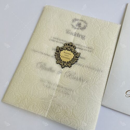 Self Embossed Design Wooly with Emblem Logo in Pearl White Wedding Invitation