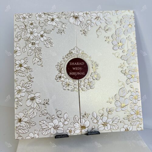 Floral Splash center fold White and Gold Theme Indian Wedding Card